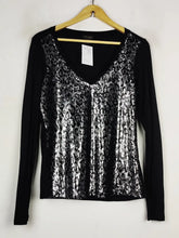 Buy online pre-used pre-loved 100% authentic & Original branded Fhalia (PW-945) available in Pakistan. Top international brands avilable.