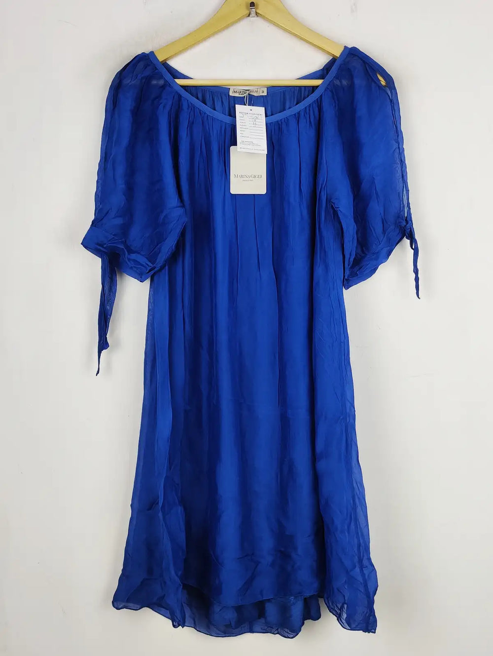 Buy online pre-used pre-loved 100% authentic & Original branded Marina Gigli (SWT-5021) available in Pakistan. Top international brands avilable.