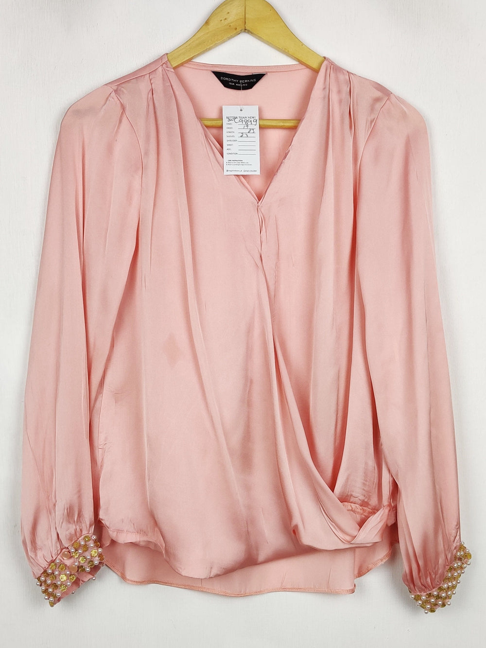 Buy online pre-used pre-loved 100% authentic & Original branded Dorothy Perkins (SWT-9899) available in Pakistan. Top international brands avilable.