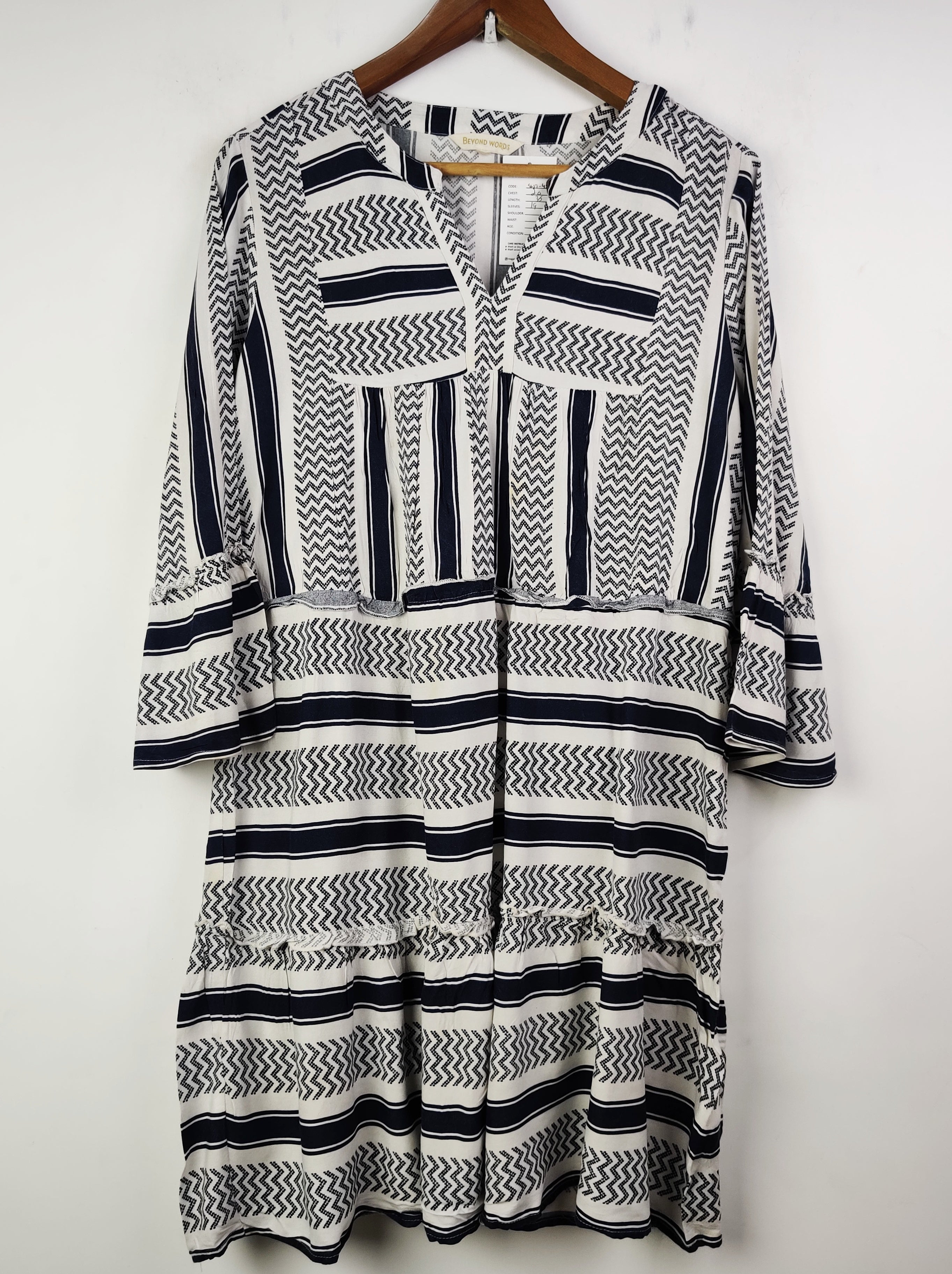Buy online pre-used pre-loved 100% authentic & Original branded Beyond Words (SWT-4811) available in Pakistan. Top international brands avilable.