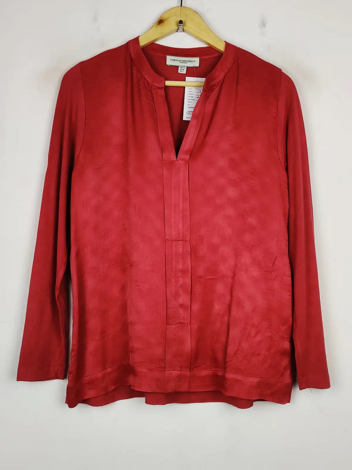 Buy online pre-used pre-loved 100% authentic & Original branded Carolyn Donnelly (SWT-5597) available in Pakistan. Top international brands avilable.