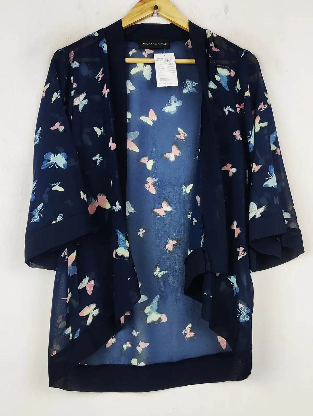Buy online pre-used pre-loved 100% authentic & Original branded Mela London (SWT-8589) available in Pakistan. Top international brands avilable.
