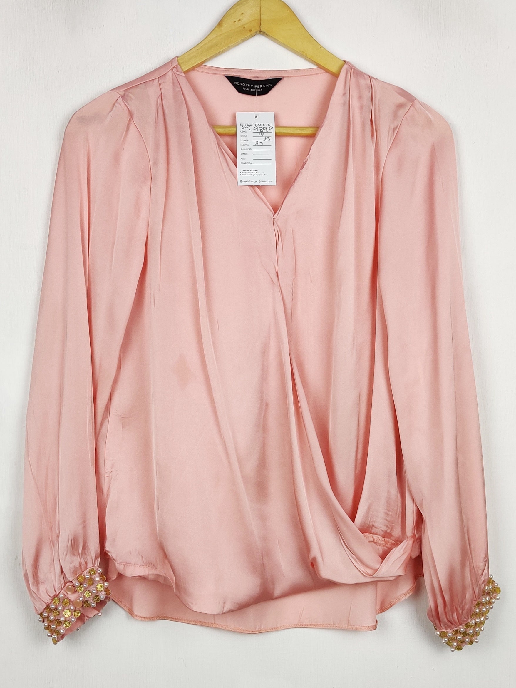 Buy online pre-used pre-loved 100% authentic & Original branded Dorothy Perkins (SWT-9899) available in Pakistan. Top international brands avilable.