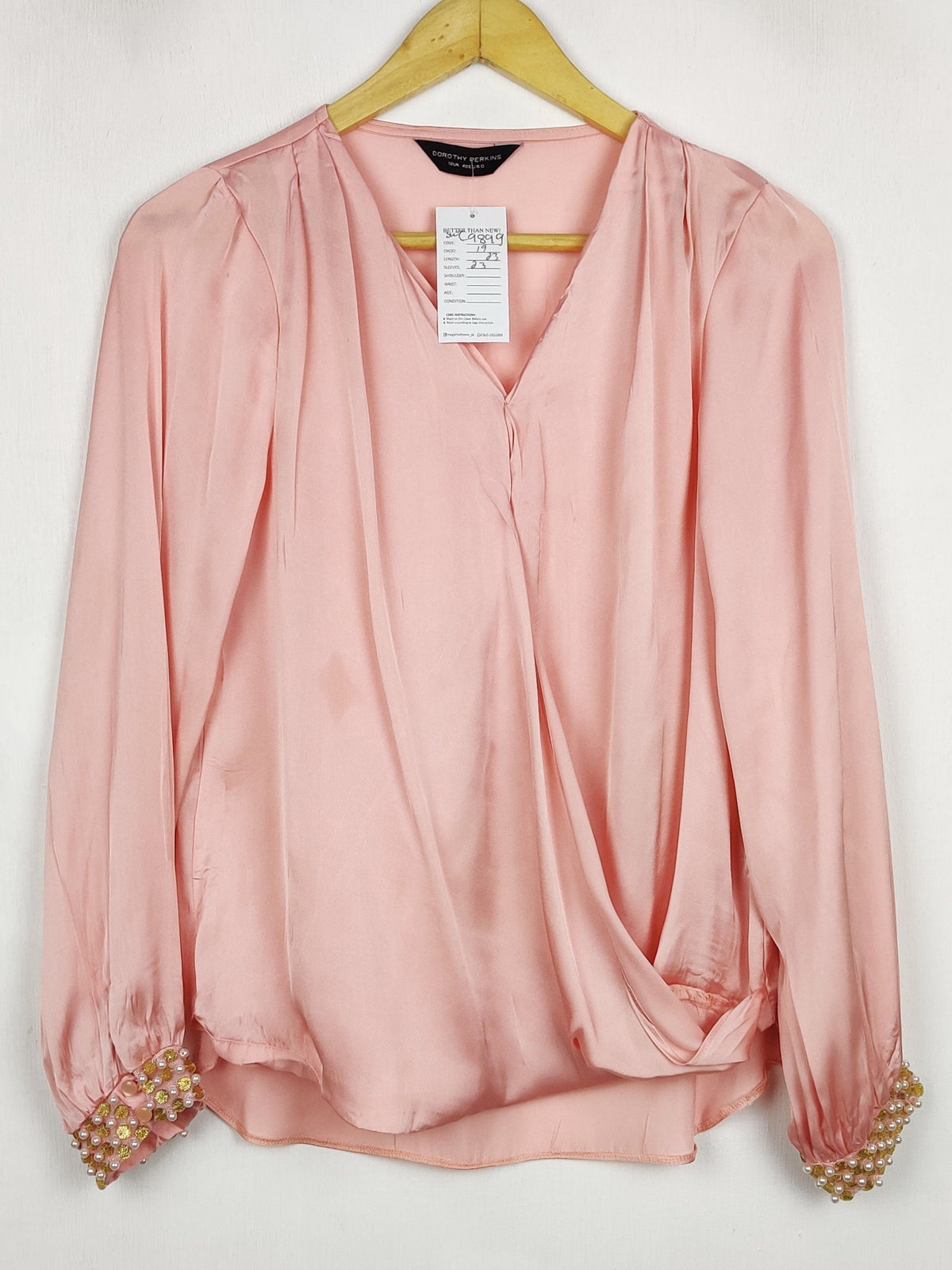 Buy online pre-used pre-loved 100% authentic & Original branded Dorothy Perkins (SWT-9899) available in Pakistan. Top international brands avilable.